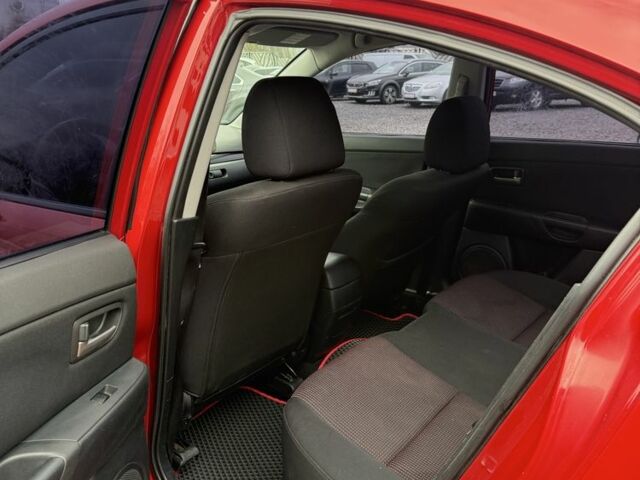 Красный Мазда 3, объемом двигателя 1.6 л и пробегом 203 тыс. км за 5300 $, фото 9 на Automoto.ua