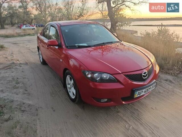 Красный Мазда 3, объемом двигателя 2 л и пробегом 286 тыс. км за 5000 $, фото 9 на Automoto.ua
