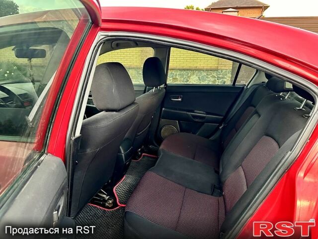 Красный Мазда 3, объемом двигателя 1.6 л и пробегом 250 тыс. км за 4750 $, фото 7 на Automoto.ua