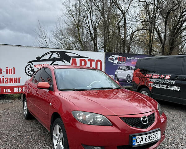 Красный Мазда 3, объемом двигателя 1.6 л и пробегом 203 тыс. км за 5300 $, фото 1 на Automoto.ua