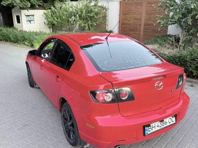 Красный Мазда 3, объемом двигателя 2 л и пробегом 297 тыс. км за 2790 $, фото 6 на Automoto.ua