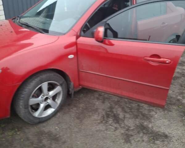 Червоний Мазда 3, об'ємом двигуна 1.6 л та пробігом 240 тис. км за 5300 $, фото 7 на Automoto.ua