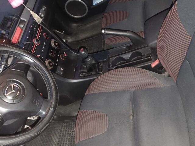 Красный Мазда 3, объемом двигателя 2 л и пробегом 211 тыс. км за 4350 $, фото 7 на Automoto.ua