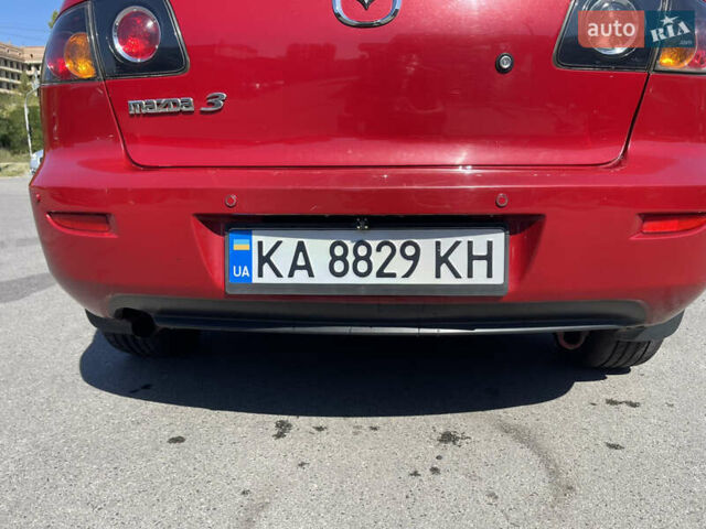 Красный Мазда 3, объемом двигателя 1.6 л и пробегом 193 тыс. км за 5700 $, фото 16 на Automoto.ua