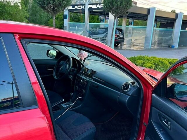 Червоний Мазда 3, об'ємом двигуна 1.6 л та пробігом 188 тис. км за 5200 $, фото 3 на Automoto.ua