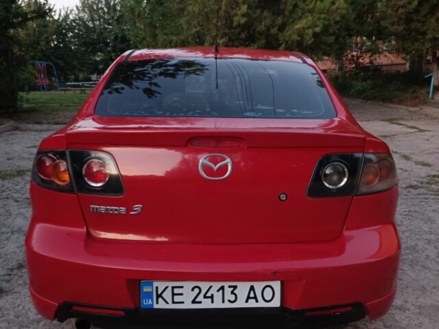 Красный Мазда 3, объемом двигателя 2 л и пробегом 211 тыс. км за 4350 $, фото 3 на Automoto.ua