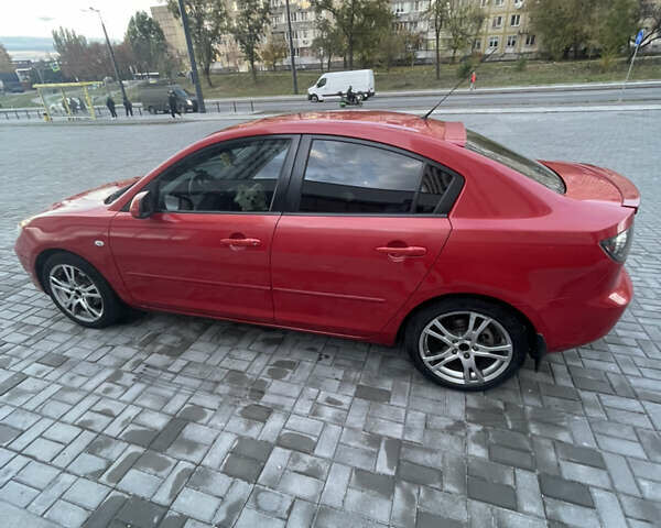 Мазда 3 2006 у Дніпро (Дніпропетровську) на Automoto.ua Червоний Мазда 3, об'ємом двигуна 1.6 л та пробігом 189 тис. км за 5500 $, фото 4 на Automoto.ua