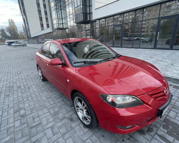 Мазда 3 2006 у Дніпро (Дніпропетровську) на Automoto.ua Червоний Мазда 3, об'ємом двигуна 1.6 л та пробігом 189 тис. км за 5500 $, фото 6 на Automoto.ua