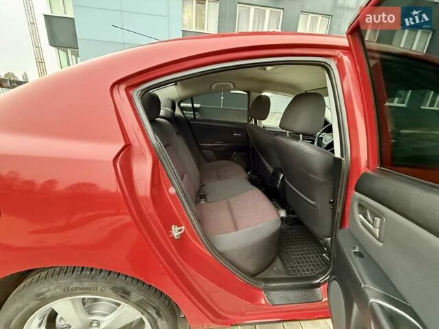 Красный Мазда 3, объемом двигателя 1.6 л и пробегом 207 тыс. км за 4400 $, фото 48 на Automoto.ua