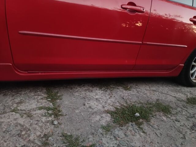 Красный Мазда 3, объемом двигателя 2 л и пробегом 211 тыс. км за 4350 $, фото 5 на Automoto.ua