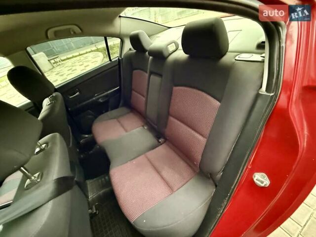 Красный Мазда 3, объемом двигателя 1.6 л и пробегом 207 тыс. км за 4400 $, фото 68 на Automoto.ua