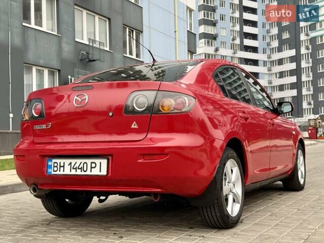 Красный Мазда 3, объемом двигателя 1.6 л и пробегом 207 тыс. км за 4400 $, фото 13 на Automoto.ua