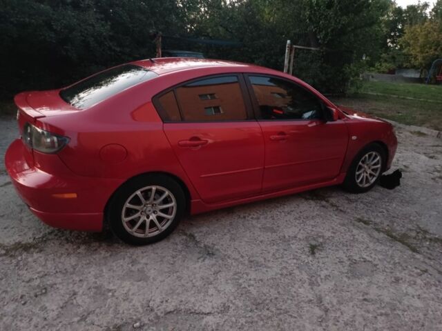 Красный Мазда 3, объемом двигателя 2 л и пробегом 211 тыс. км за 4350 $, фото 10 на Automoto.ua