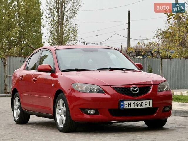 Красный Мазда 3, объемом двигателя 1.6 л и пробегом 207 тыс. км за 4400 $, фото 3 на Automoto.ua