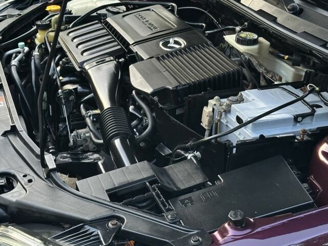 Червоний Мазда 3, об'ємом двигуна 1.6 л та пробігом 186 тис. км за 6000 $, фото 21 на Automoto.ua