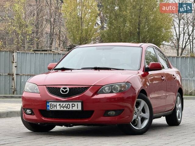 Красный Мазда 3, объемом двигателя 1.6 л и пробегом 207 тыс. км за 4400 $, фото 1 на Automoto.ua