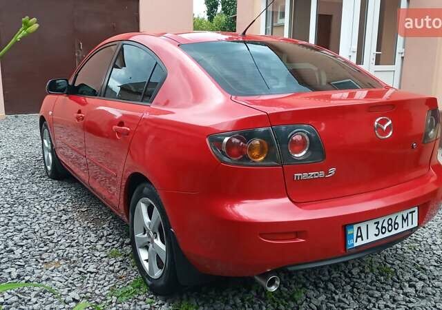 Красный Мазда 3, объемом двигателя 1.6 л и пробегом 277 тыс. км за 4800 $, фото 3 на Automoto.ua
