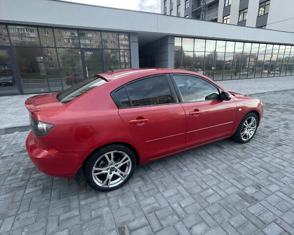 Мазда 3 2006 у Дніпро (Дніпропетровську) на Automoto.ua Червоний Мазда 3, об'ємом двигуна 1.6 л та пробігом 189 тис. км за 5500 $, фото 3 на Automoto.ua