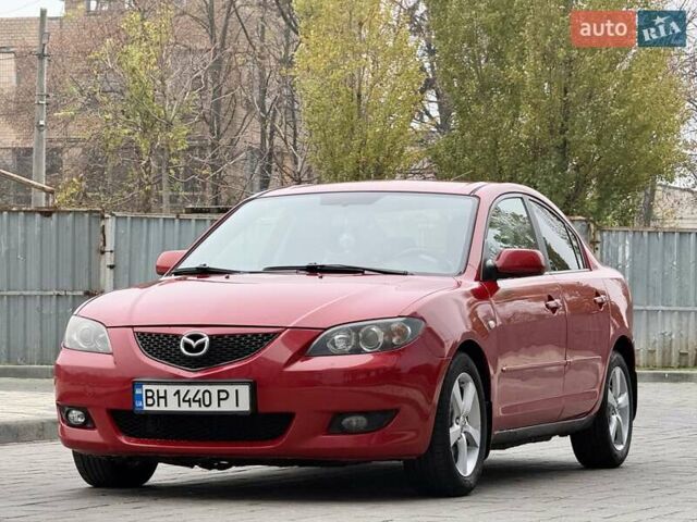 Красный Мазда 3, объемом двигателя 1.6 л и пробегом 207 тыс. км за 4400 $, фото 4 на Automoto.ua