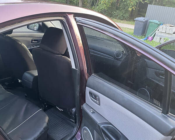 Красный Мазда 3, объемом двигателя 2 л и пробегом 283 тыс. км за 3800 $, фото 26 на Automoto.ua