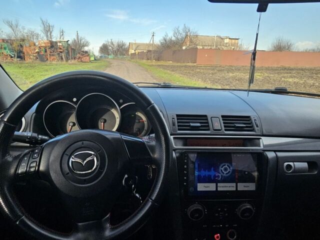 Красный Мазда 3, объемом двигателя 2 л и пробегом 260 тыс. км за 4800 $, фото 2 на Automoto.ua