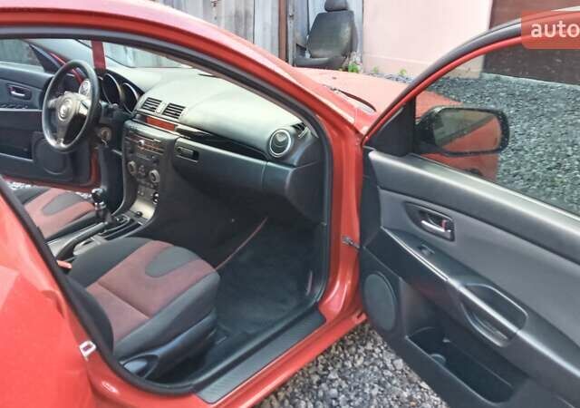 Красный Мазда 3, объемом двигателя 1.6 л и пробегом 277 тыс. км за 4800 $, фото 13 на Automoto.ua