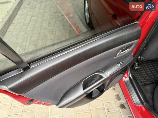 Красный Мазда 3, объемом двигателя 1.6 л и пробегом 207 тыс. км за 4400 $, фото 58 на Automoto.ua