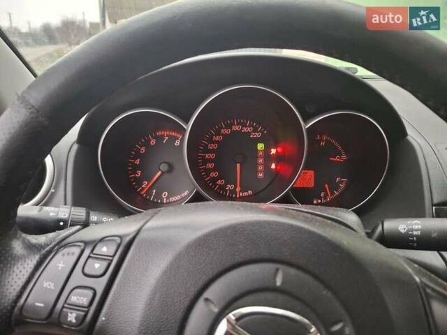 Червоний Мазда 3, об'ємом двигуна 1.6 л та пробігом 240 тис. км за 5300 $, фото 2 на Automoto.ua