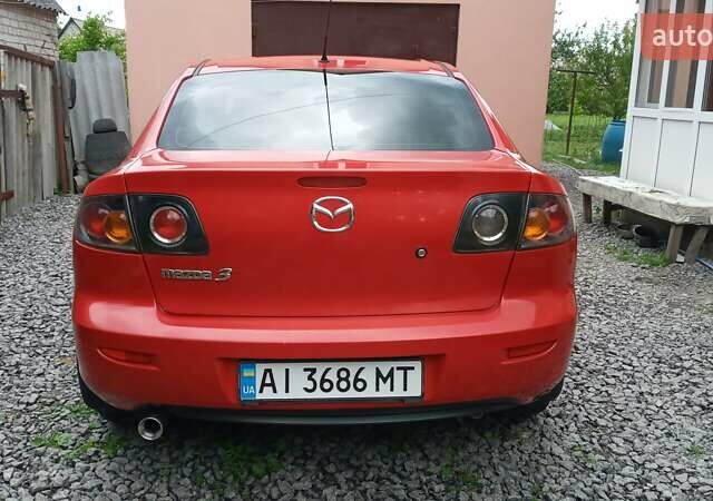 Красный Мазда 3, объемом двигателя 1.6 л и пробегом 277 тыс. км за 4800 $, фото 4 на Automoto.ua