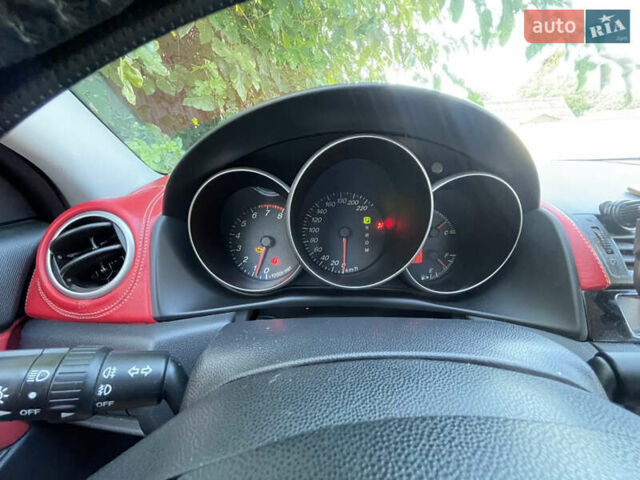 Красный Мазда 3, объемом двигателя 1.6 л и пробегом 193 тыс. км за 5700 $, фото 27 на Automoto.ua