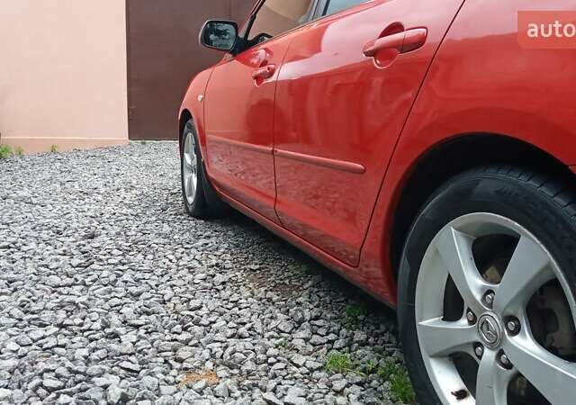 Красный Мазда 3, объемом двигателя 1.6 л и пробегом 277 тыс. км за 4800 $, фото 7 на Automoto.ua