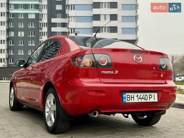 Красный Мазда 3, объемом двигателя 1.6 л и пробегом 207 тыс. км за 4400 $, фото 12 на Automoto.ua