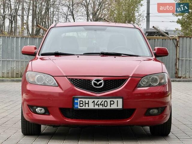 Красный Мазда 3, объемом двигателя 1.6 л и пробегом 207 тыс. км за 4400 $, фото 2 на Automoto.ua