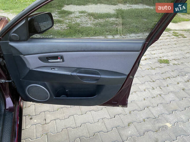 Красный Мазда 3, объемом двигателя 2 л и пробегом 283 тыс. км за 3800 $, фото 27 на Automoto.ua