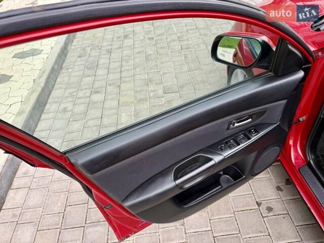 Красный Мазда 3, объемом двигателя 1.6 л и пробегом 207 тыс. км за 4400 $, фото 18 на Automoto.ua