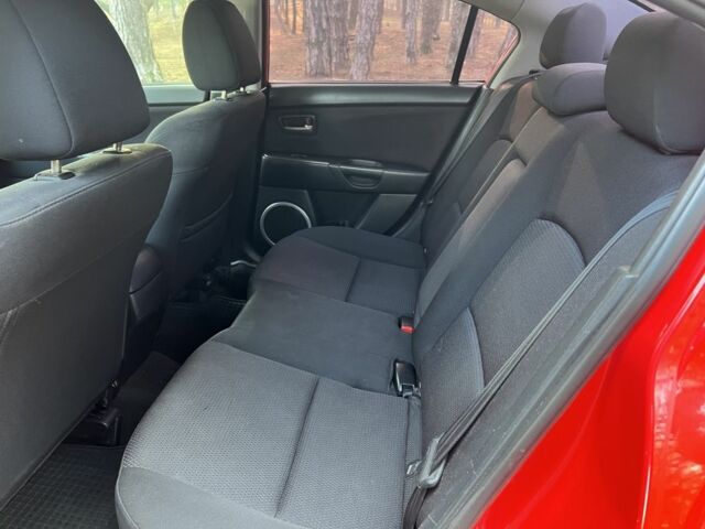 Красный Мазда 3, объемом двигателя 1.6 л и пробегом 230 тыс. км за 5500 $, фото 11 на Automoto.ua