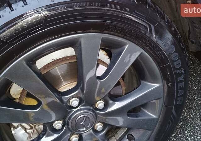 Красный Мазда 3, объемом двигателя 1.6 л и пробегом 161 тыс. км за 5450 $, фото 13 на Automoto.ua