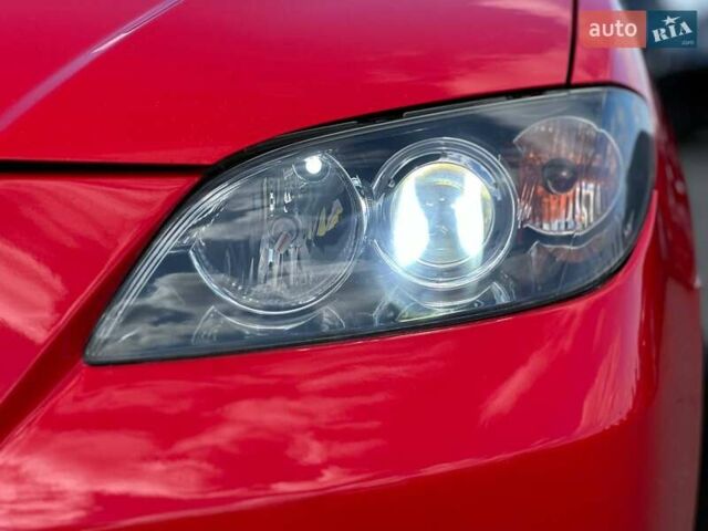 Красный Мазда 3, объемом двигателя 1.6 л и пробегом 225 тыс. км за 5800 $, фото 8 на Automoto.ua