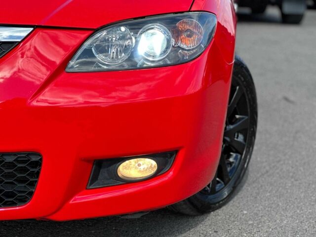 Красный Мазда 3, объемом двигателя 1.6 л и пробегом 225 тыс. км за 5800 $, фото 3 на Automoto.ua