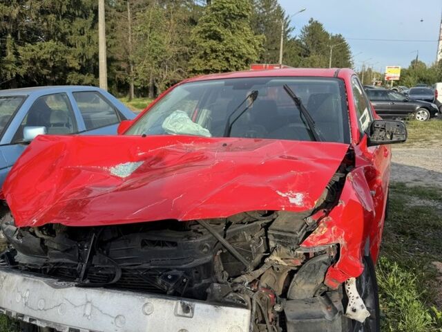 Красный Мазда 3, объемом двигателя 2 л и пробегом 295 тыс. км за 3000 $, фото 1 на Automoto.ua