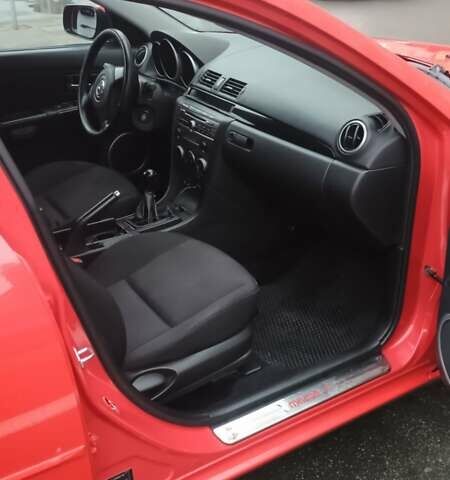 Красный Мазда 3, объемом двигателя 1.6 л и пробегом 161 тыс. км за 5450 $, фото 3 на Automoto.ua