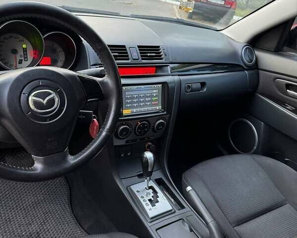 Красный Мазда 3, объемом двигателя 1.6 л и пробегом 131 тыс. км за 6600 $, фото 7 на Automoto.ua