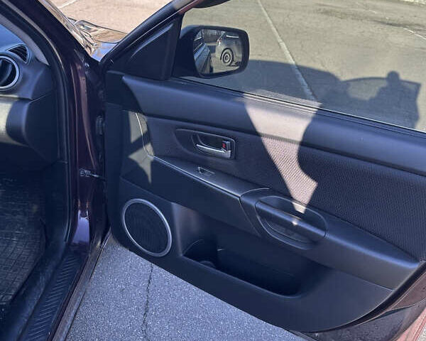 Красный Мазда 3, объемом двигателя 1.6 л и пробегом 192 тыс. км за 5500 $, фото 9 на Automoto.ua