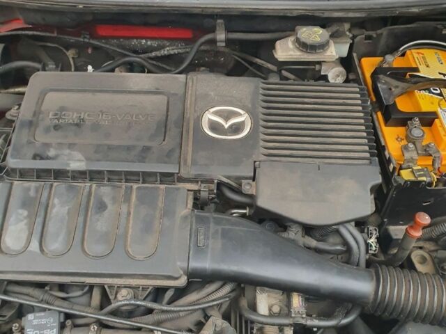 Красный Мазда 3, объемом двигателя 1.6 л и пробегом 120 тыс. км за 4000 $, фото 2 на Automoto.ua