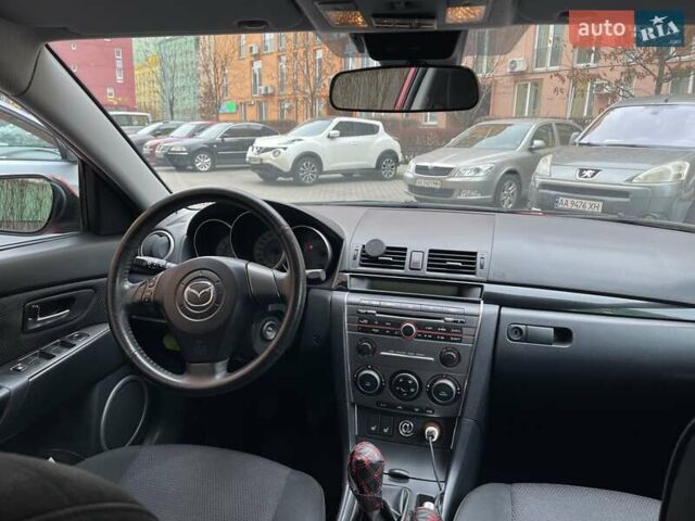 Красный Мазда 3, объемом двигателя 1.6 л и пробегом 106 тыс. км за 5600 $, фото 13 на Automoto.ua