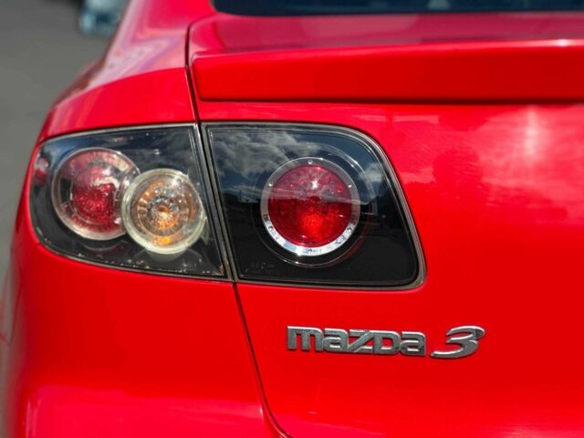 Красный Мазда 3, объемом двигателя 1.6 л и пробегом 225 тыс. км за 5800 $, фото 7 на Automoto.ua