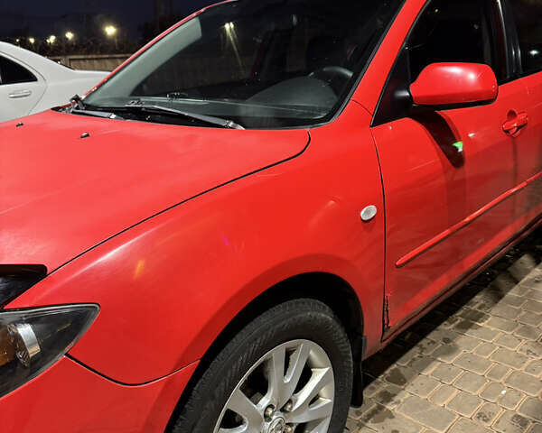 Красный Мазда 3, объемом двигателя 1.6 л и пробегом 234 тыс. км за 3999 $, фото 3 на Automoto.ua