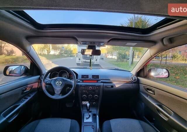 Червоний Мазда 3, об'ємом двигуна 1.6 л та пробігом 150 тис. км за 5550 $, фото 9 на Automoto.ua