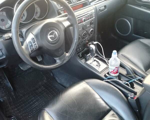 Красный Мазда 3, объемом двигателя 1.6 л и пробегом 167 тыс. км за 5999 $, фото 1 на Automoto.ua