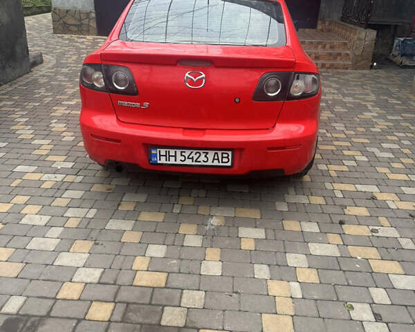 Красный Мазда 3, объемом двигателя 1.6 л и пробегом 310 тыс. км за 4500 $, фото 6 на Automoto.ua